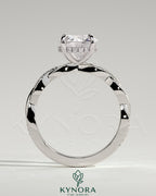 Kynora CJ 2ct round claw solitaire engagement ring with hidden halo and twisted pave band, crafted in sterling silver.