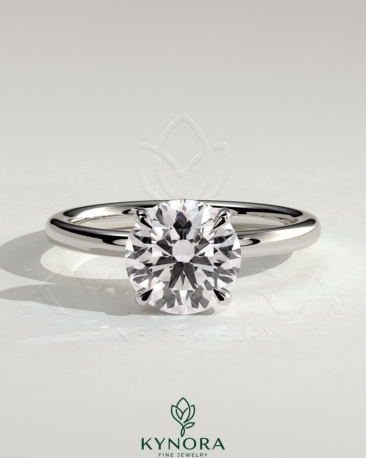 Kynora CJ 2ct round claw solitaire engagement ring with hidden halo, showcasing sparkling diamond centerpiece and elegant design. Imagen principal del producto