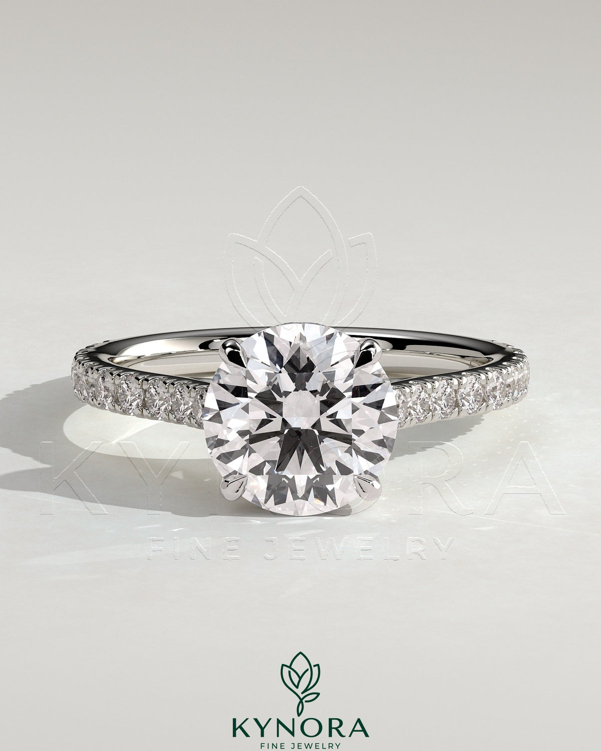 Kynora CJ 2ct round solitaire engagement ring with hidden halo, pave band, and cathedral high setting, showcasing intricate jewelry design. Main image