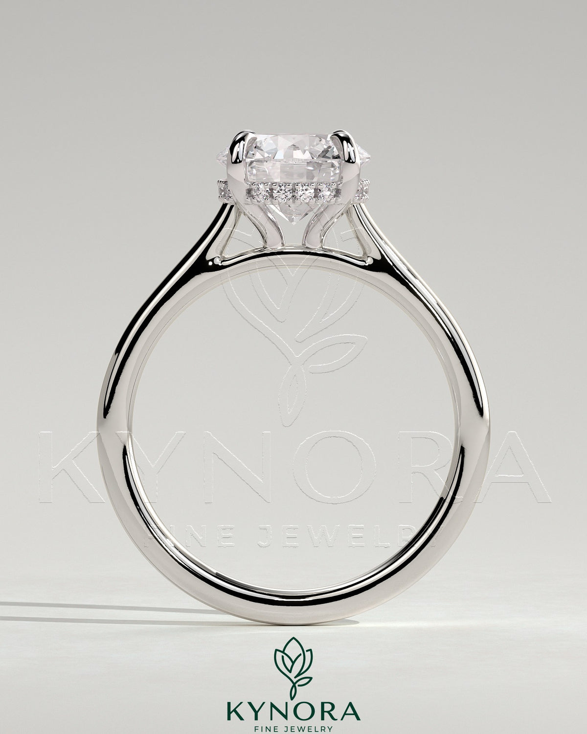 Kynora CJ 2ct round diamond solitaire engagement ring with hidden halo, tapered band, and cathedral high setting.