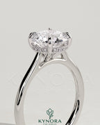 Kynora CJ 2ct round diamond solitaire engagement ring with hidden halo, tapered band, and cathedral high setting.