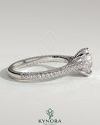 Kynora CJ 2ct round claw solitaire engagement ring with hidden halo, triple pave band, cathedral high setting, elegant jewelry design