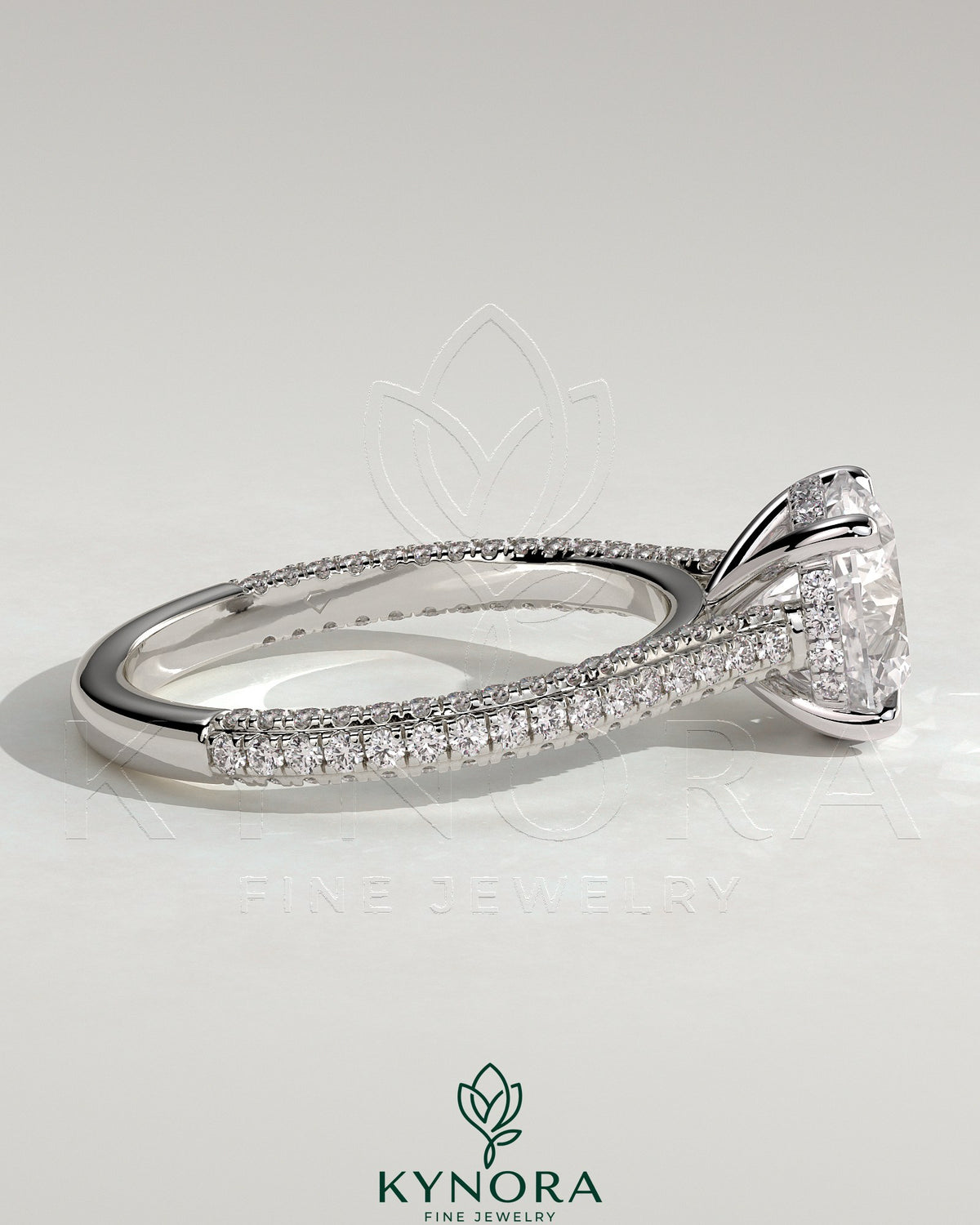 Kynora CJ 2ct round claw solitaire engagement ring with hidden halo, triple pave band, cathedral high setting, elegant jewelry design