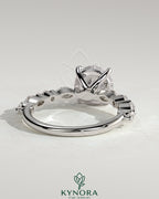 Kynora CJ 2ct round claw solitaire engagement ring with marquise and round accent stones, elegant jewelry for special occasions