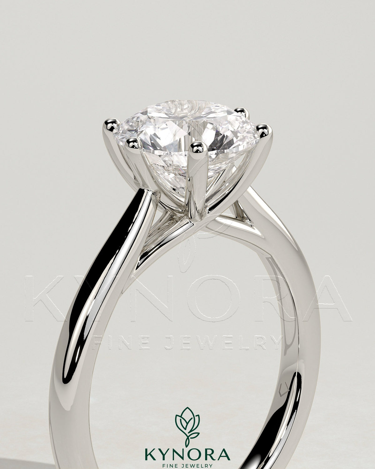 Kynora CJ 2ct round claw solitaire engagement ring with open trellis gallery and cathedral low setting, showcasing elegant diamond design.