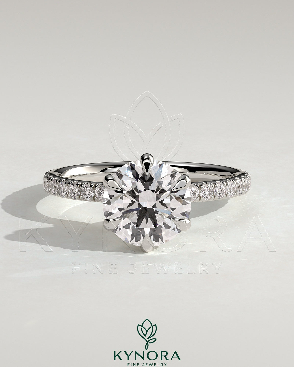 Kynora CJ 2ct round diamond claw solitaire engagement ring with pave band and pave collar in elegant jewelry setting
