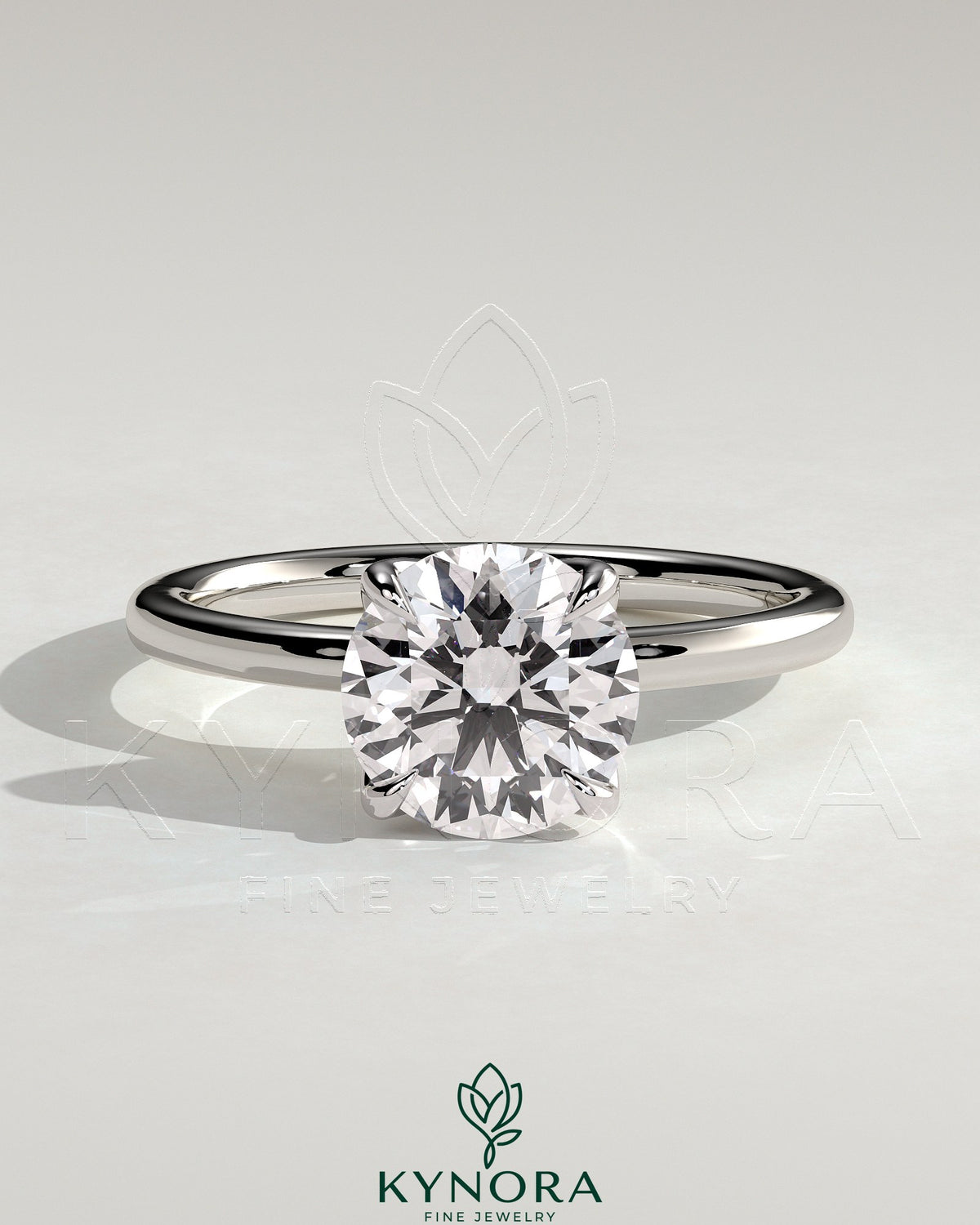 Kynora CJ 2ct round claw solitaire engagement ring with petal gallery, leaf accents, and cathedral setting, showcasing fine jewelry craftsmanship.