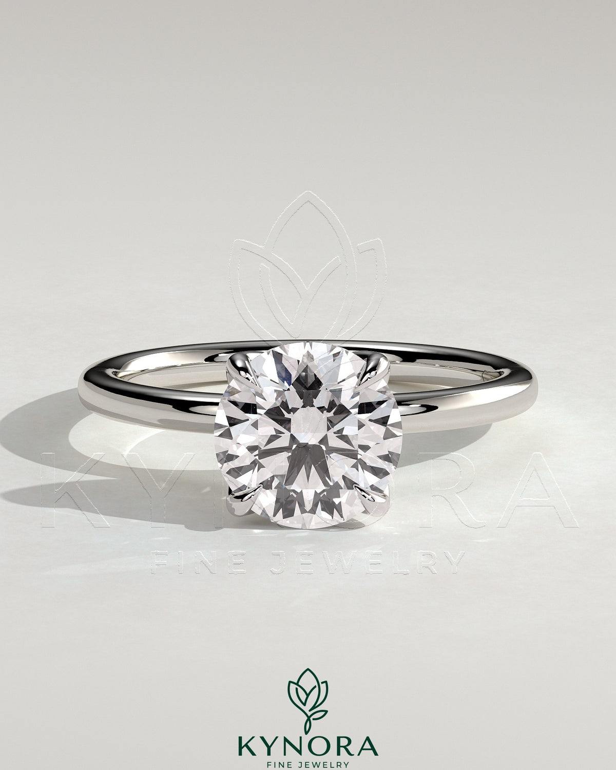 Kynora CJ 2ct round claw solitaire engagement ring with petal gallery and accented tiara detail, showcasing intricate design.