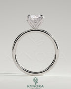 Kynora CJ 2ct round claw solitaire engagement ring with petal gallery and accented tiara detail, showcasing intricate design and sparkling diamond