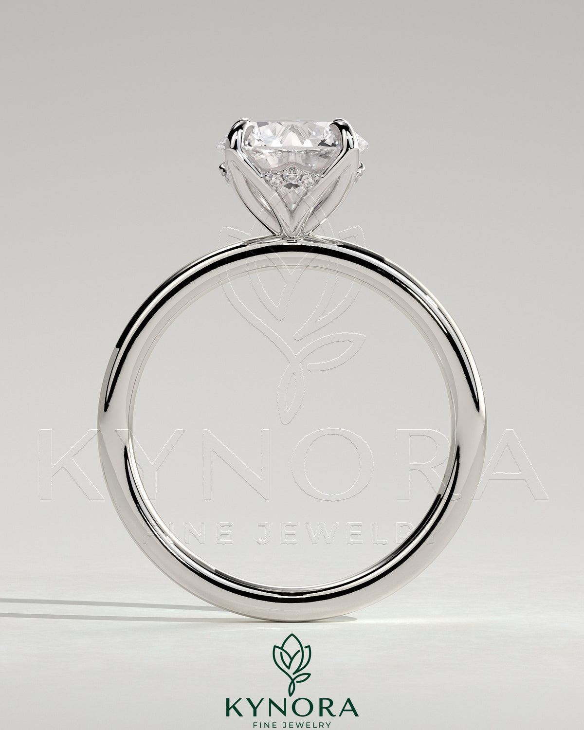 Kynora CJ 2ct round claw solitaire engagement ring with petal gallery and accented tiara detail, showcasing intricate design and sparkling diamond