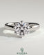 Kynora CJ 2ct round claw solitaire engagement ring with petal gallery and cigar band design in sterling silver.
