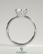 Kynora CJ 2ct round claw solitaire engagement ring with petal gallery and cigar band design, crafted in elegant gold.