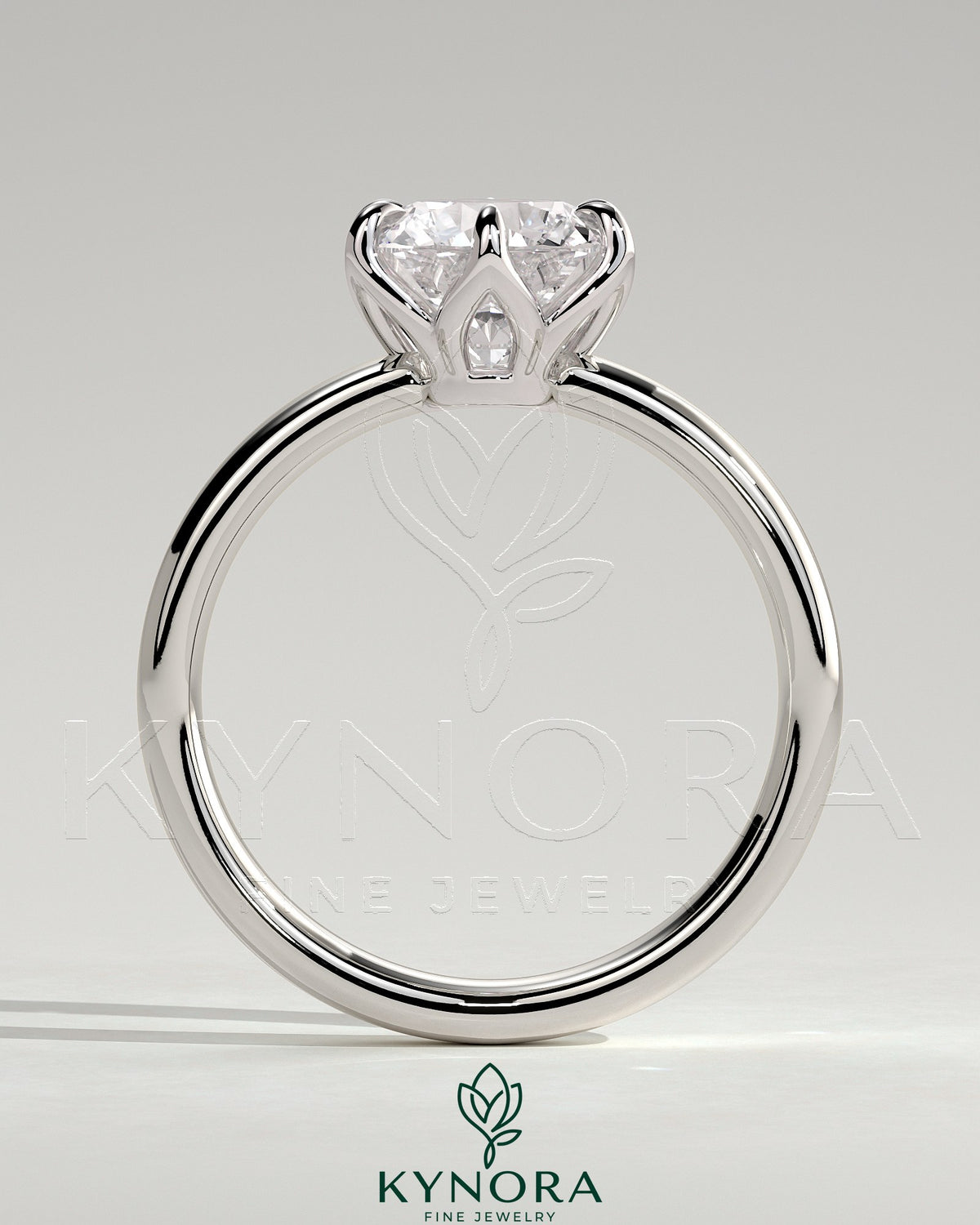 Kynora CJ 2ct round claw solitaire engagement ring with petal gallery and cigar band design, crafted in elegant gold.