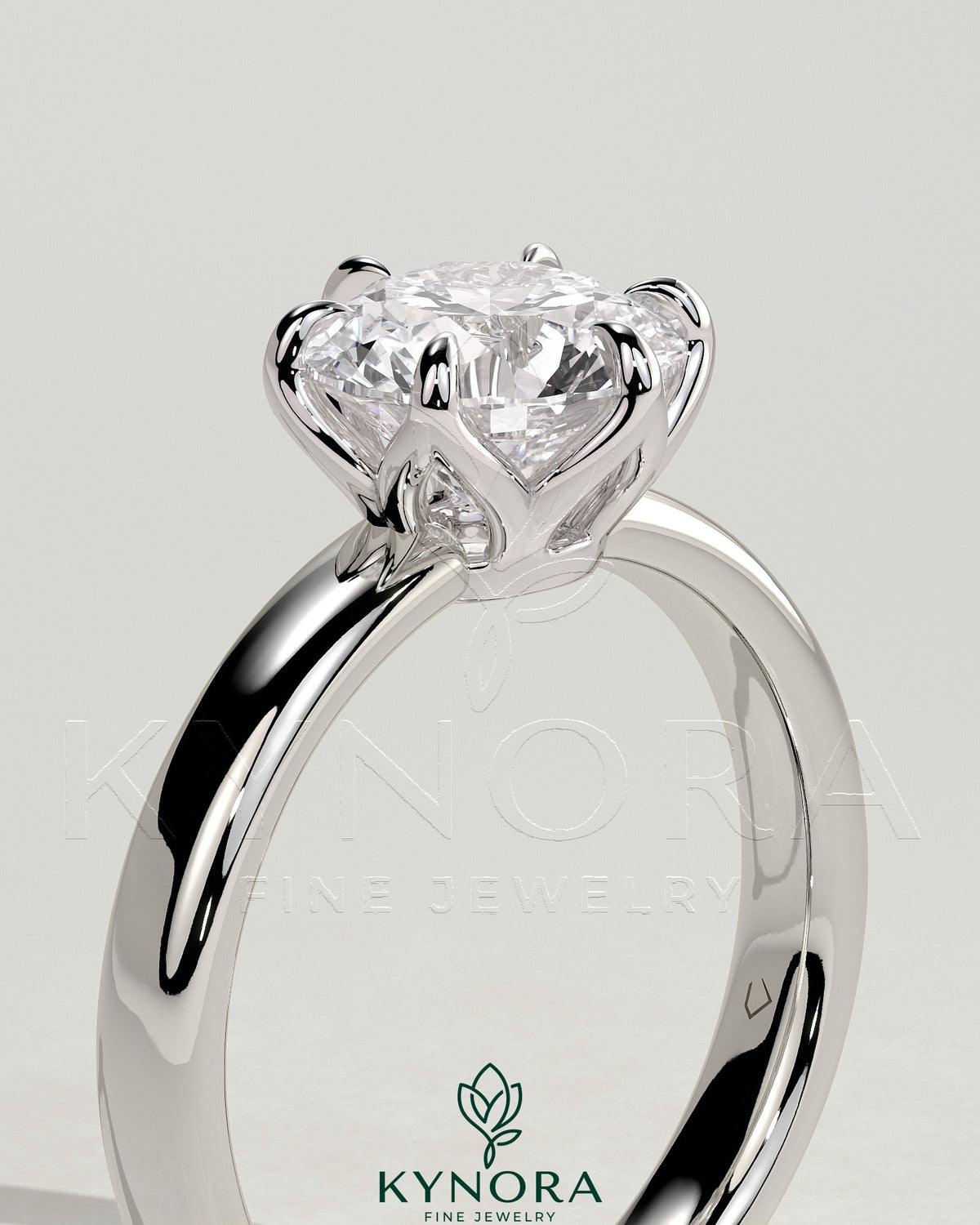 Kynora CJ 2ct round claw solitaire engagement ring with petal gallery and cigar band design, showcasing a sparkling diamond.