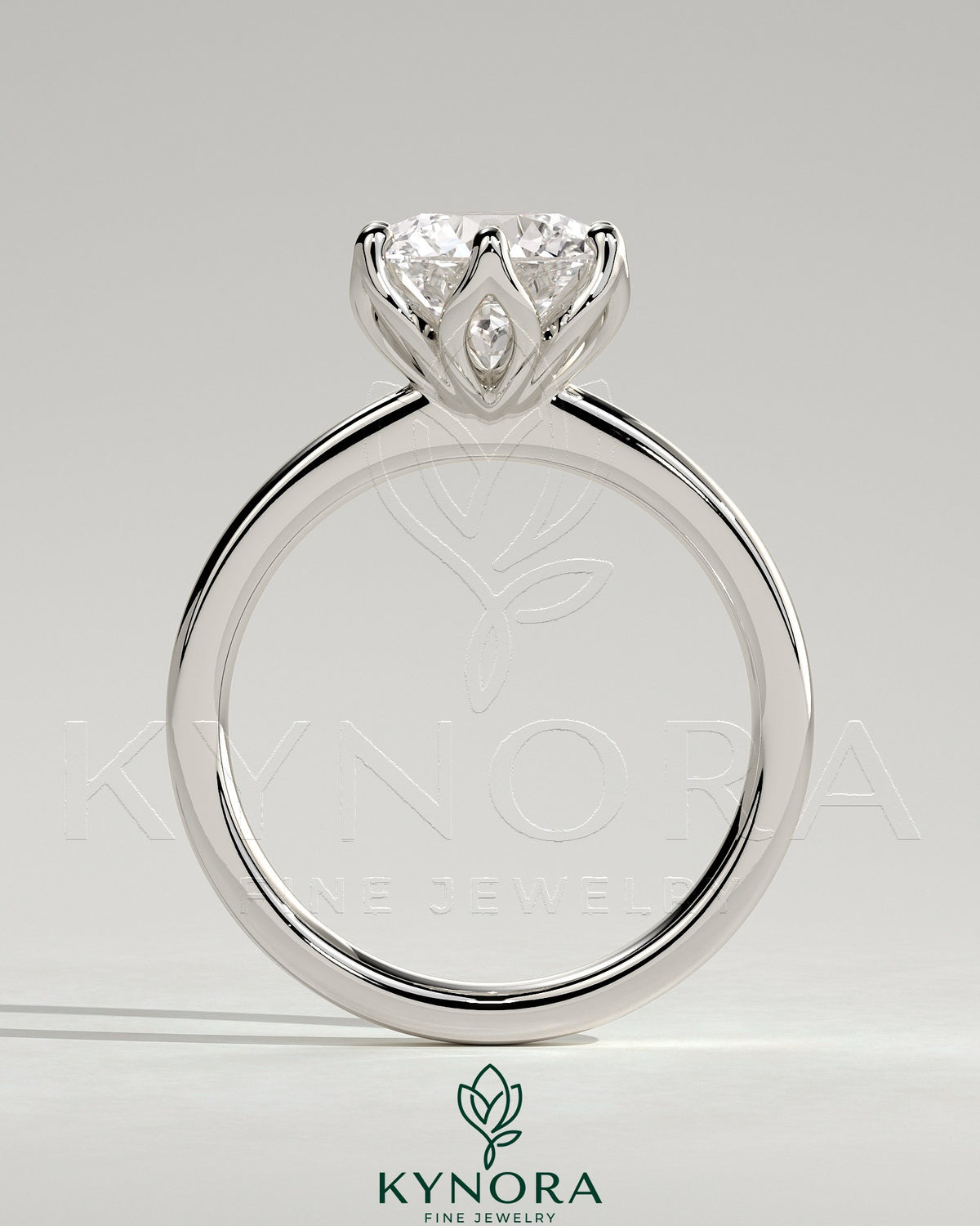 Kynora CJ 2ct round claw solitaire engagement ring with petal gallery detail and tapered band in sterling silver.