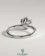 Kynora CJ 2-carat round claw solitaire engagement ring with petal gallery design and sparkling diamond setting