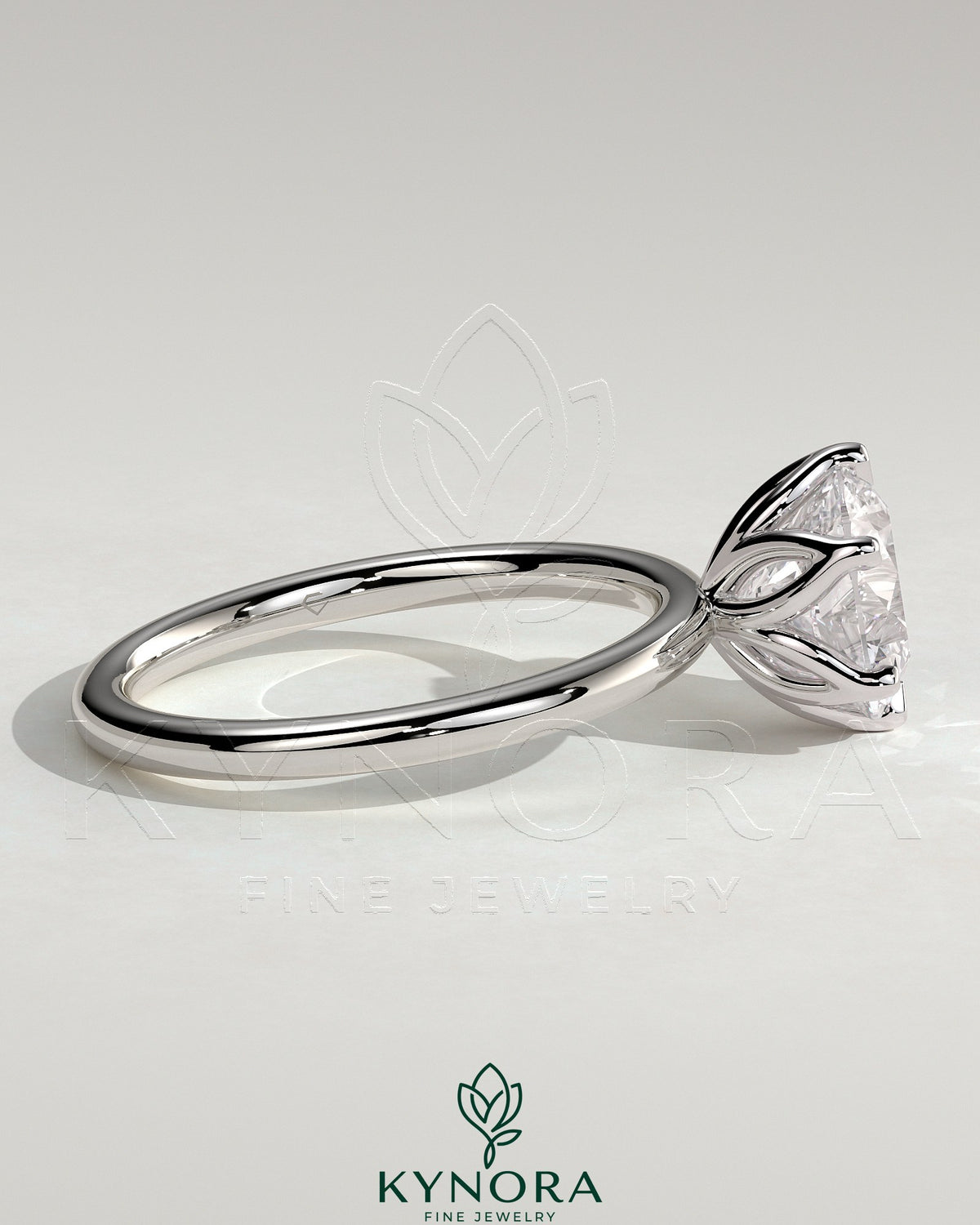 Kynora CJ 2ct round claw solitaire engagement ring featuring a petal gallery design with a sparkling central diamond.