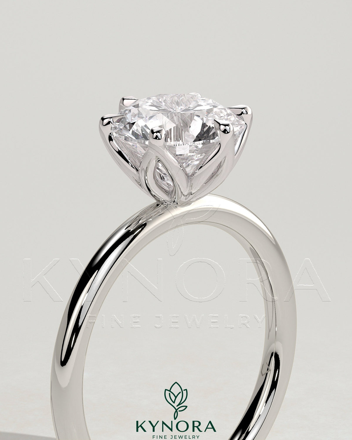 Kynora CJ 2-carat round claw solitaire engagement ring with petal gallery design, featuring a sparkling central diamond.