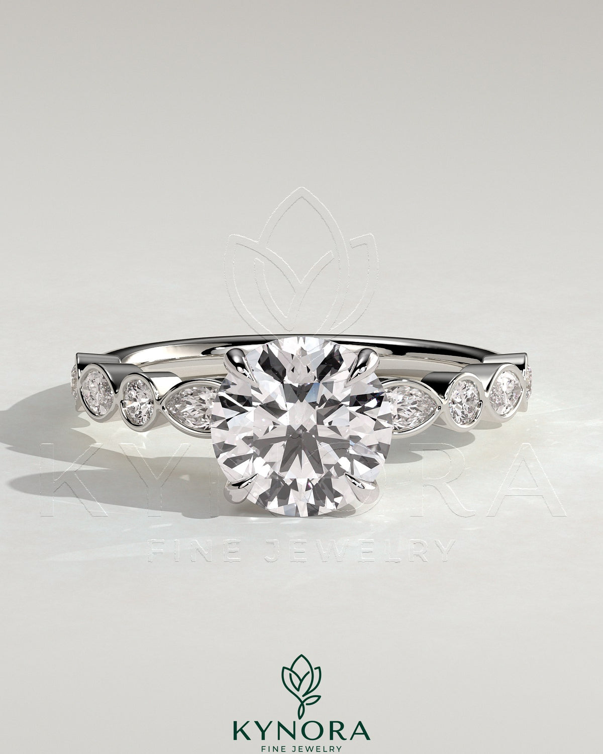 Kynora CJ 2ct round claw solitaire engagement ring with round-marquise bezel accent stones in a sleek design. Main image