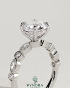 Kynora CJ 2ct round claw solitaire engagement ring with round-marquise bezel accent stones, sterling silver jewelry.