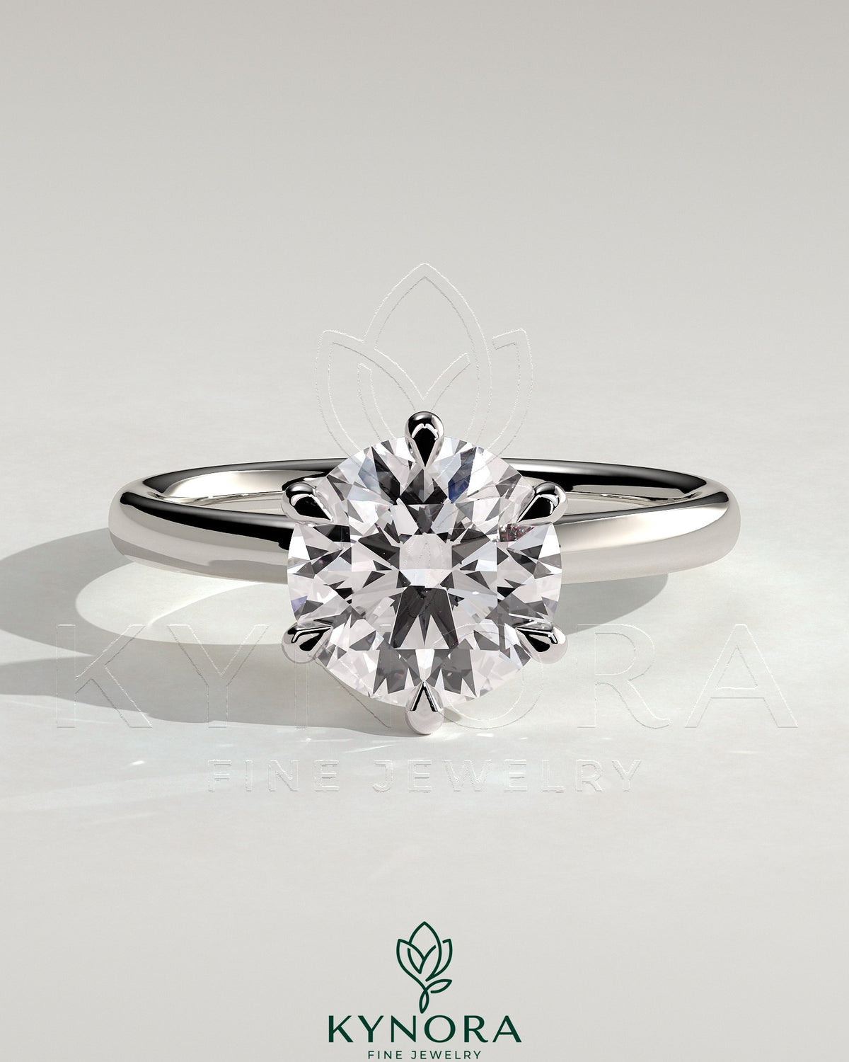 Kynora CJ 2ct round diamond claw solitaire engagement ring with a solid cathedral high setting, showcasing elegant jewelry craftsmanship. Imagen principal del producto