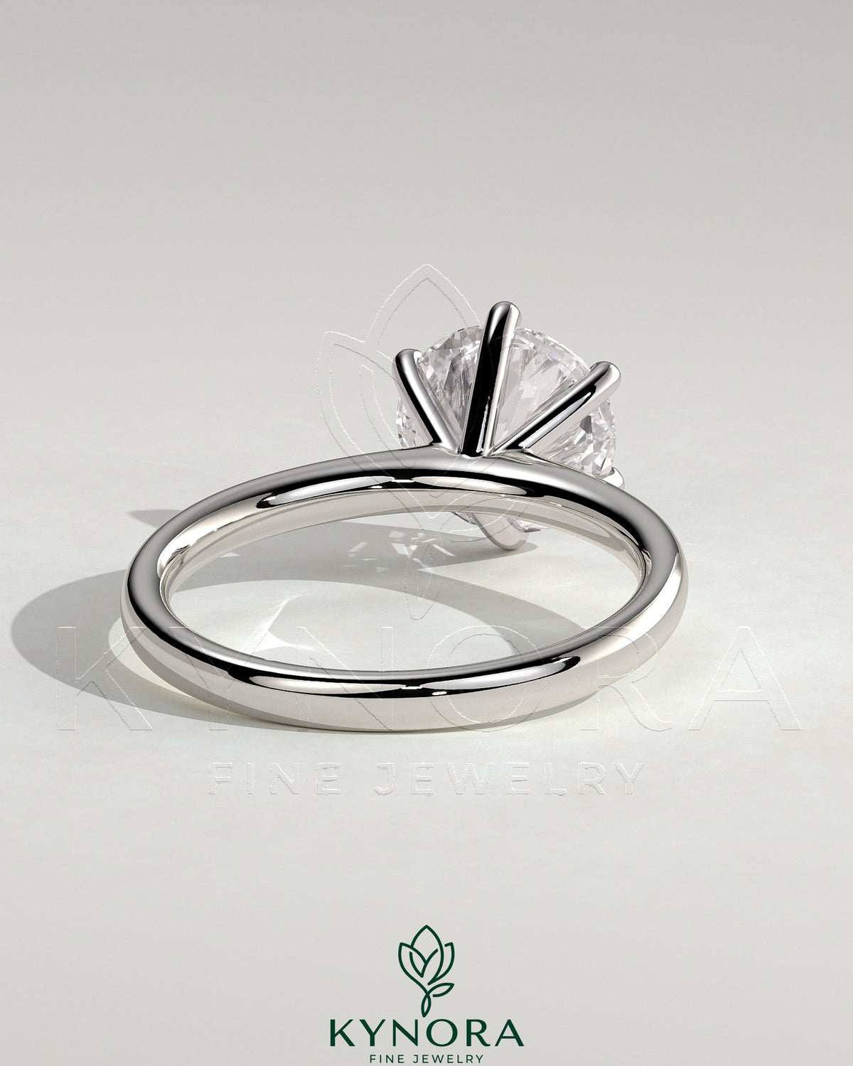 Kynora CJ 2ct round diamond claw solitaire engagement ring with a solid cathedral high setting showcasing the sparkling diamond.