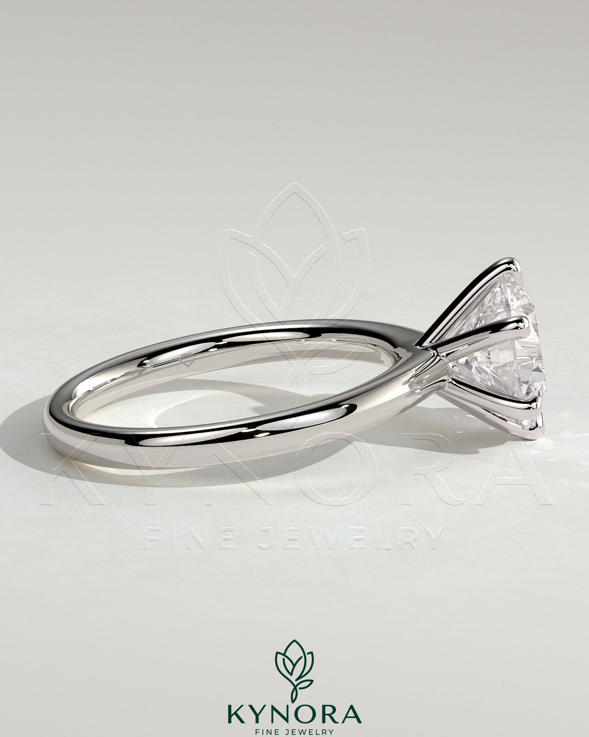 Kynora CJ 2ct round diamond solitaire engagement ring with solid cathedral high setting and claw prongs.