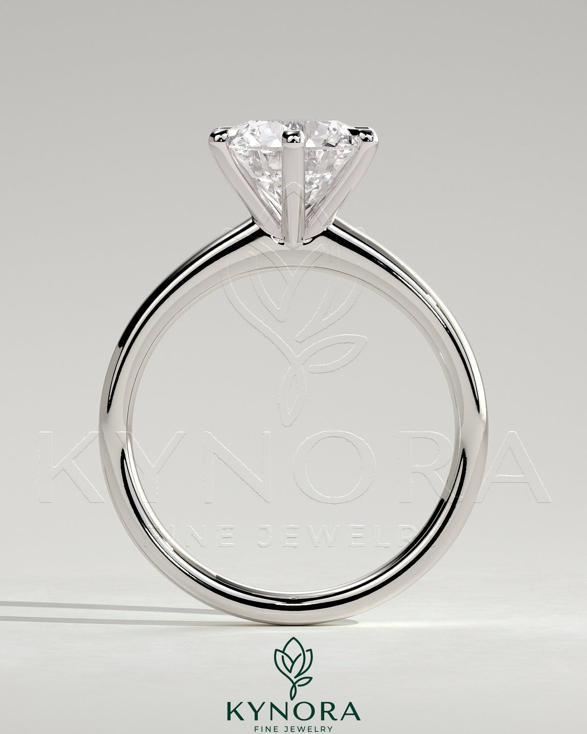 Kynora CJ 2ct round diamond solitaire engagement ring with high cathedral setting and solid band, elegant and classic jewelry piece.