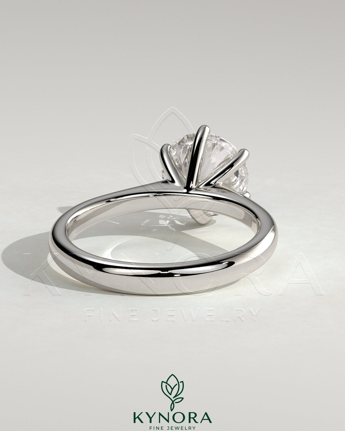 Kynora CJ 2ct round diamond solitaire engagement ring with solid cathedral low setting in elegant jewelry design.