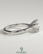 Kynora CJ 2ct round diamond solitaire engagement ring with solid cathedral low setting and classic design.