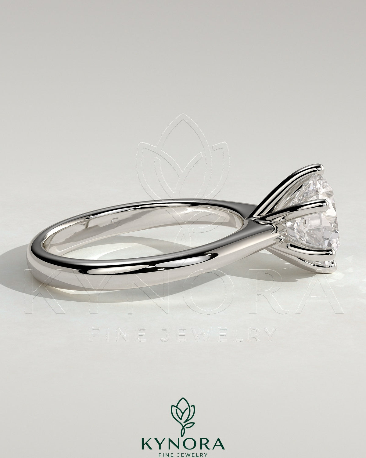 Kynora CJ 2ct round diamond solitaire engagement ring with solid cathedral low setting and classic design.