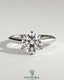 Kynora CJ 2ct round claw solitaire engagement ring with square tips and high cathedral setting, showcasing elegant jewelry craftsmanship.