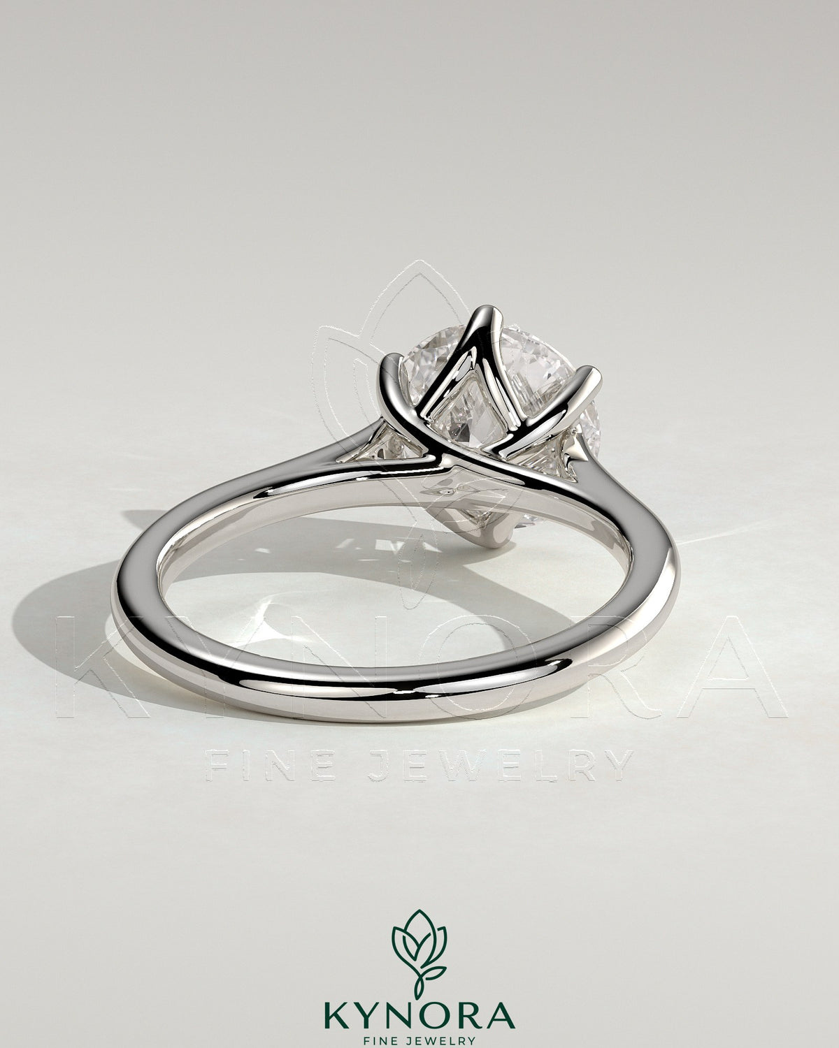 Kynora CJ 2ct round claw solitaire engagement ring with trellis gallery, lattice detail, and cathedral low setting.