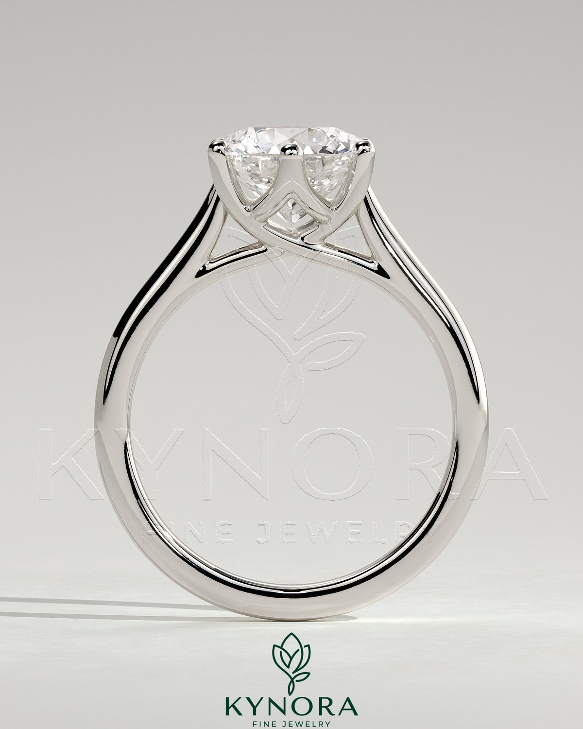 Kynora CJ 2ct round claw solitaire engagement ring with trellis gallery, lattice detail, and cathedral low setting.