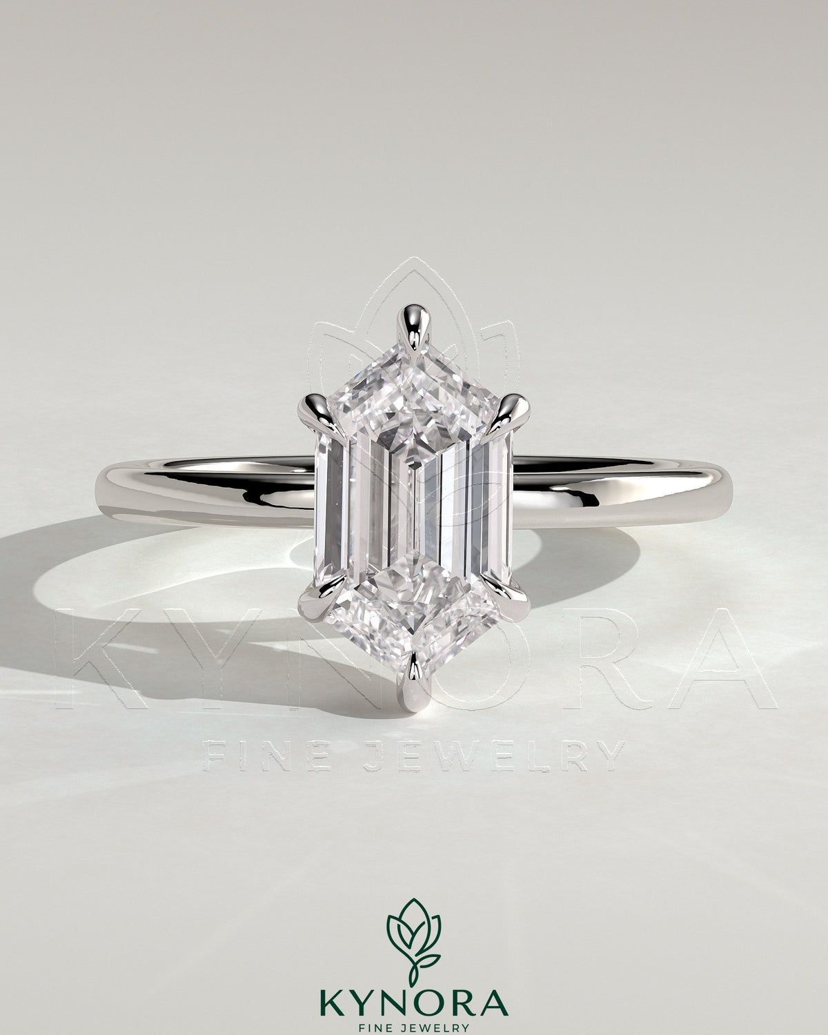 Kynora CJ Classic 2ct elongated hexagon claw solitaire engagement ring with a sleek band and detailed setting. Imagen principal del producto