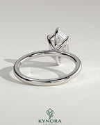 Kynora CJ classic 2ct elongated hexagon claw solitaire engagement ring showcasing a prominent diamond setting.