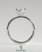 Elegant solitaire engagement ring featuring a 2-carat elongated hexagon diamond set in a classic Kynora CJ design.