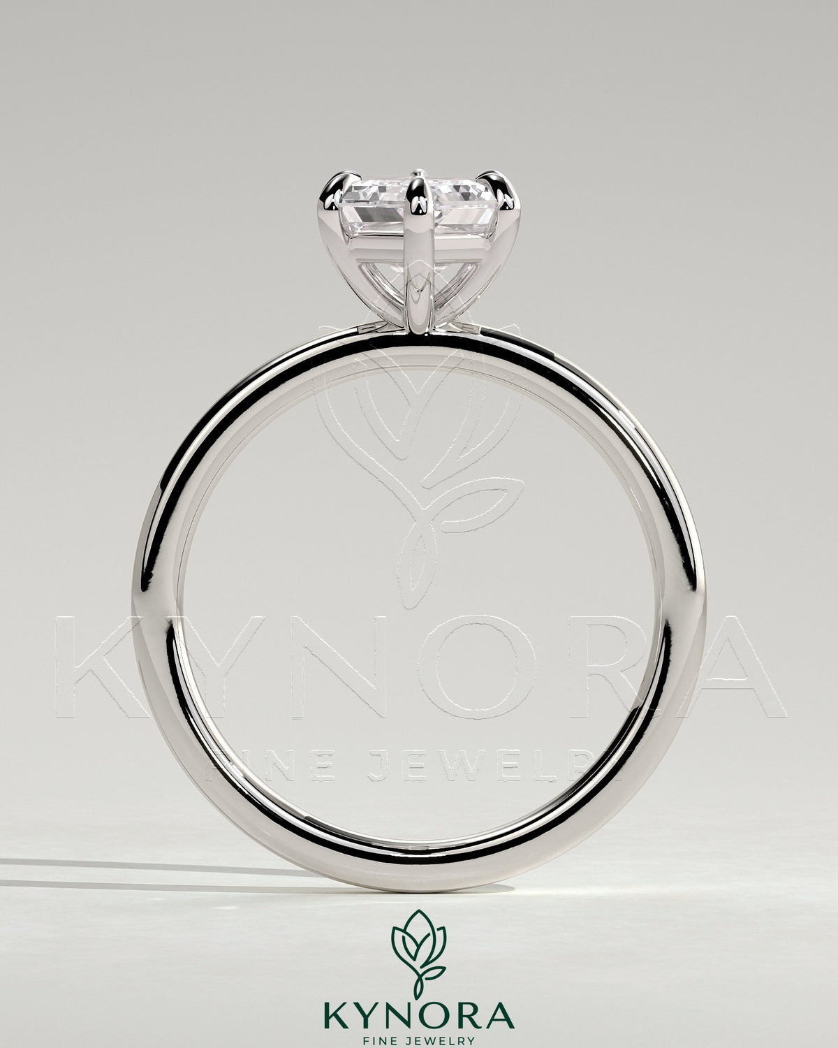 Elegant solitaire engagement ring featuring a 2-carat elongated hexagon diamond set in a classic Kynora CJ design.