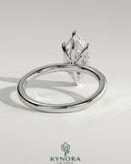 Kynora CJ classic 2ct marquise claw solitaire engagement ring with a prominent marquise diamond set in a sleek band.