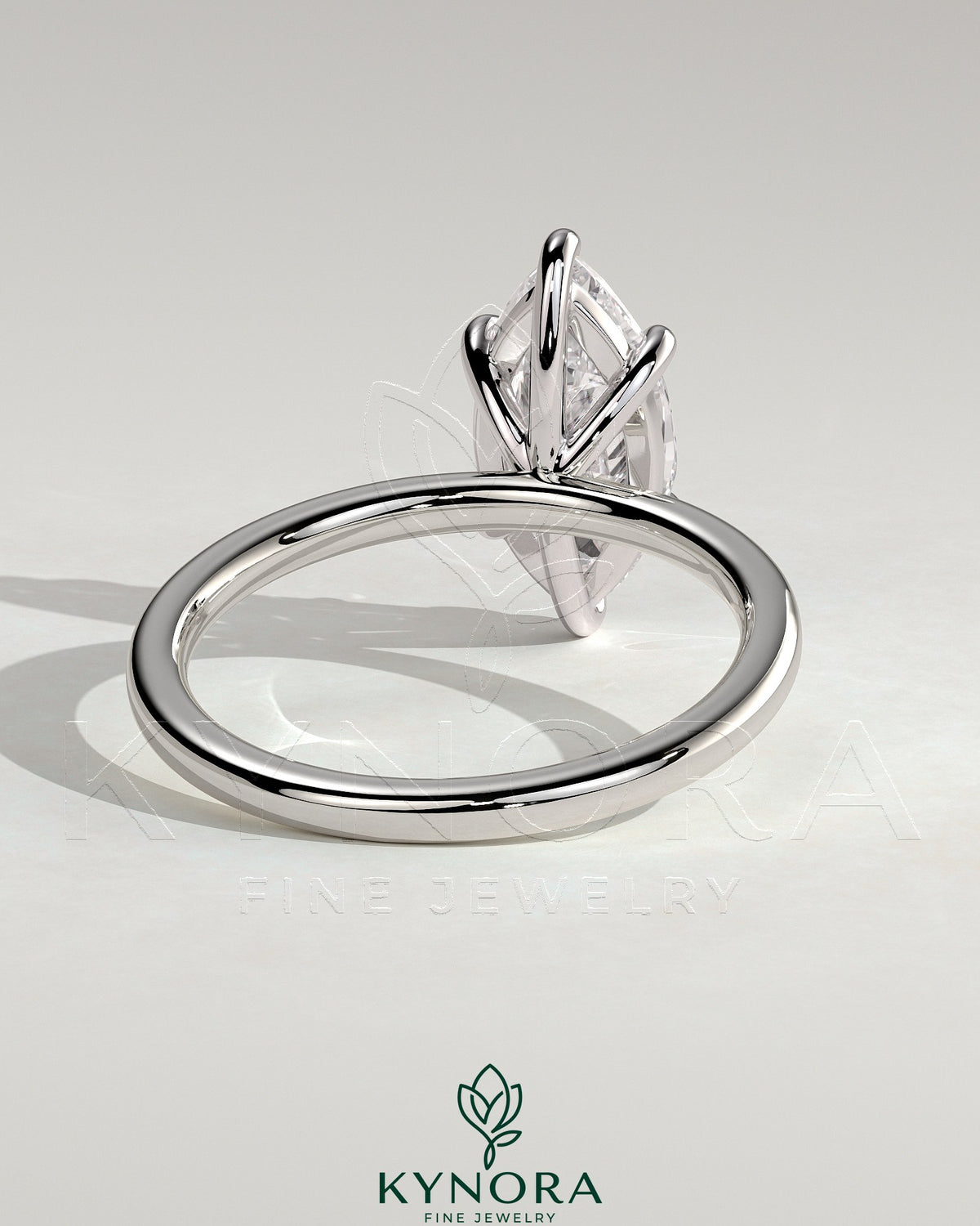 Kynora CJ classic 2ct marquise claw solitaire engagement ring with a prominent marquise diamond set in a sleek band.