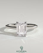 Kynora CJ Radiant Claw Solitaire engagement ring with hidden halo, tapered band, and cathedral high setting in silver.