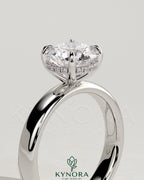 Kynora CJ statement 2ct round claw solitaire engagement ring with cigar band and hidden halo, showcasing elegant jewelry craftsmanship.