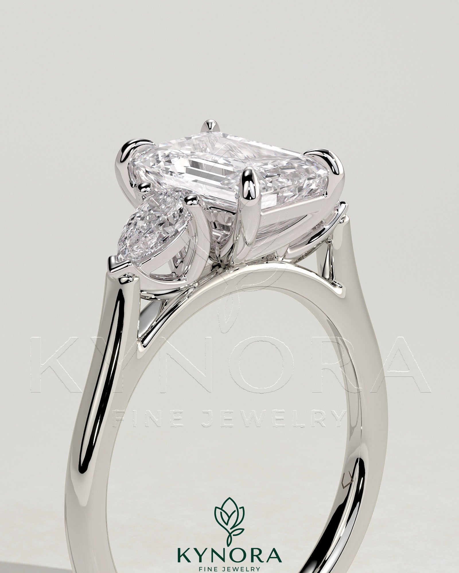 2ct Emerald Claw Trilogy with Pear Side Stones and Cathedral Setting Engagement Ring Secondary image
