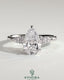 Kynora CJ 2ct pear claw solitaire engagement ring with pear accents and round shoulder stones, showcasing elegant craftsmanship.