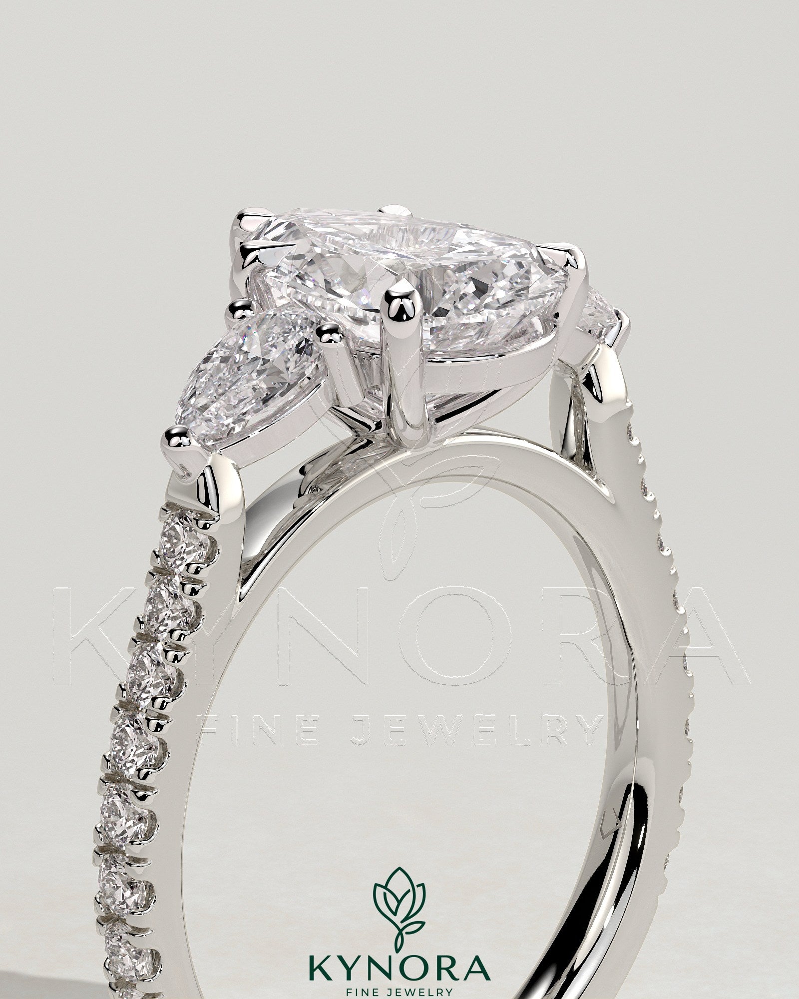 2ct Pear Claw Trilogy with Pear Side Stones, Pave Band and Cathedral High Setting Engagement Ring Imagen secundaria del producto