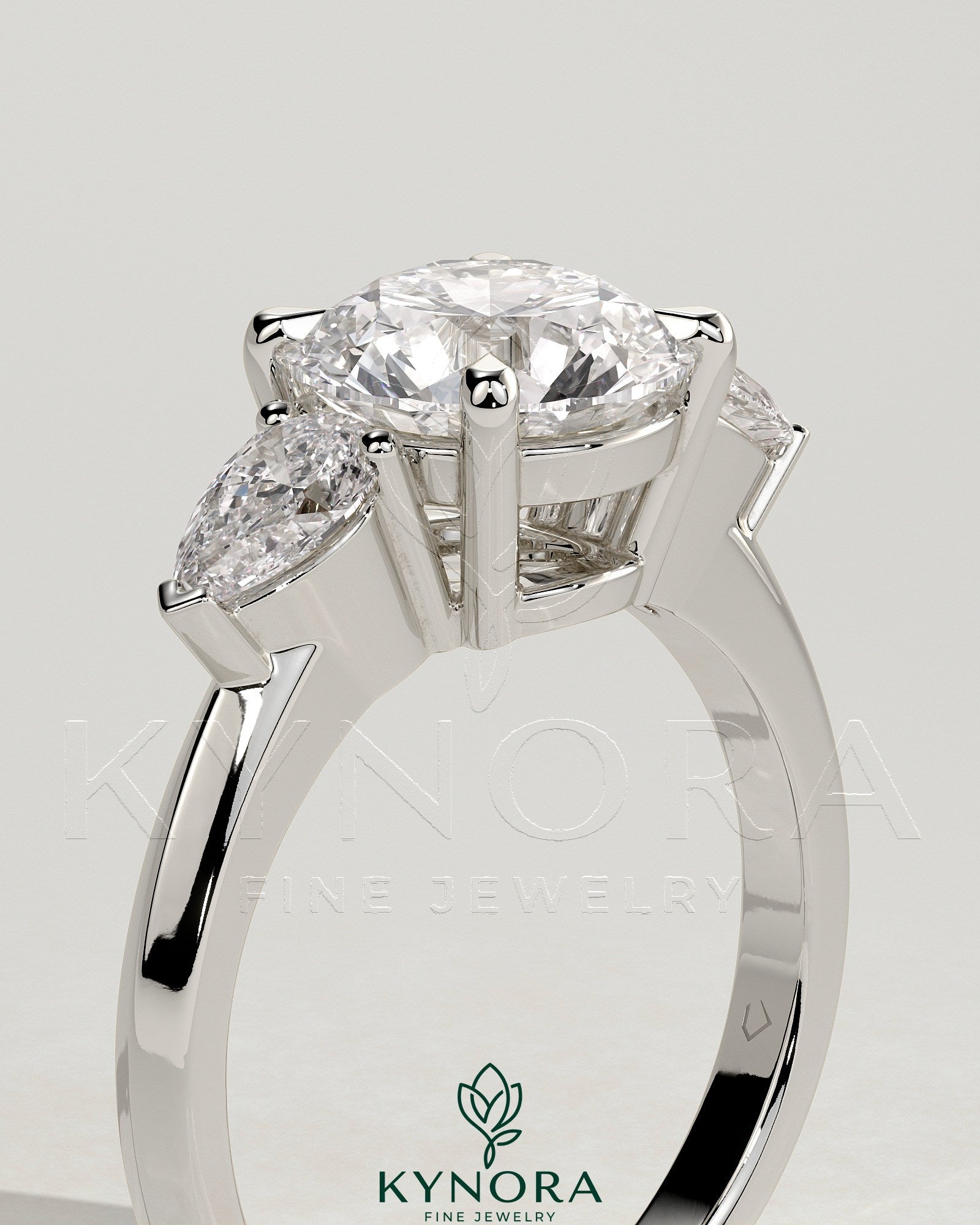 2ct Round Claw Trilogy with Pear Side Stones and Knife Edge Band Engagement Ring Secondary image