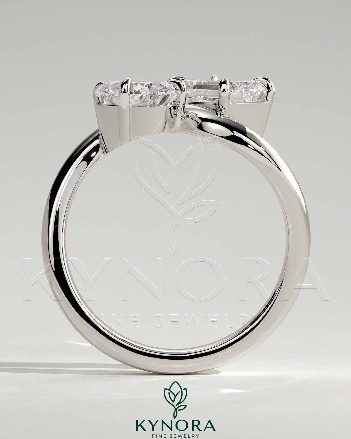 Kynora CJ Claw Toi et Moi engagement ring with wave band featuring two intertwined diamonds on a sleek band.