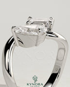 Kynora CJ Claw Toi et Moi engagement ring with wave band featuring two sparkling gemstones in a unique design