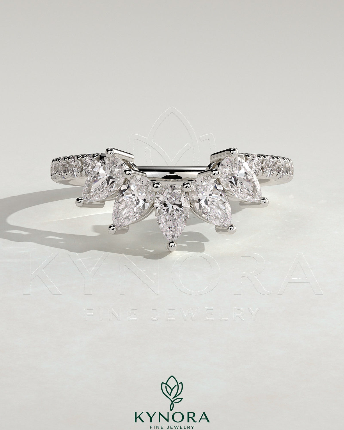 Kynora CJ accent stone wedding band with curved pave design, showcasing sparkling stones and elegant craftsmanship.