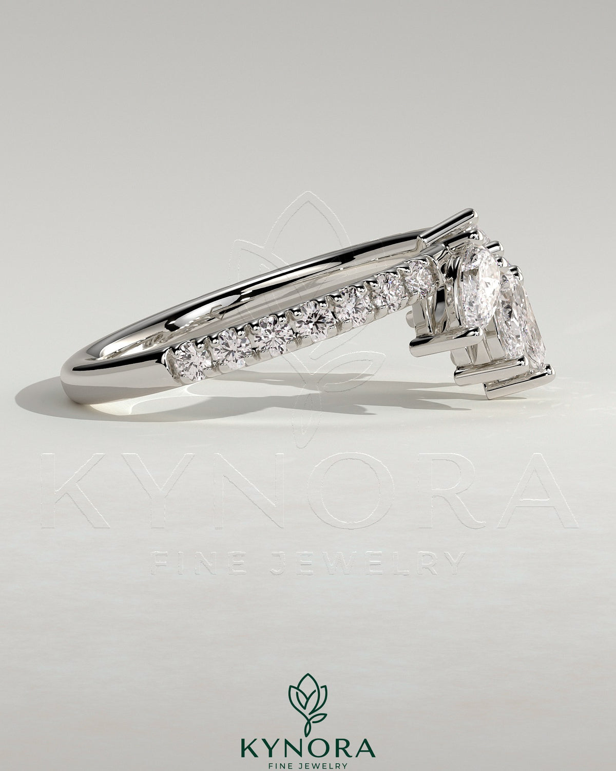 Kynora CJ accent wedding band with curved pave stone design, featuring sparkling gemstones on a sleek gold band.